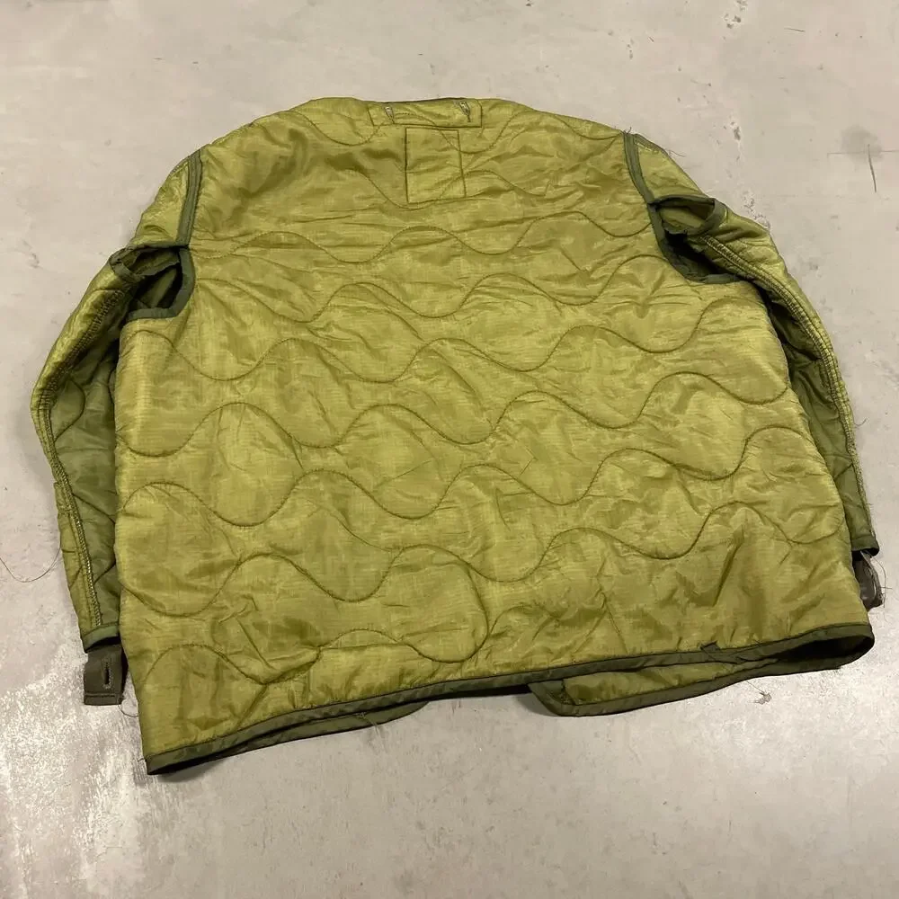 vintage men’s 90s green textured military liner quilted jacket